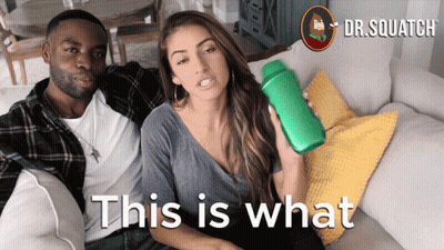 Man And Woman Sitting On Couch GIF