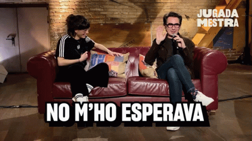 Man And Woman Sitting On Couch No M Ho Esperava GIF