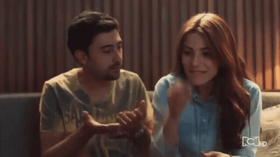 Man And Woman Sitting On Couch With HD GIF