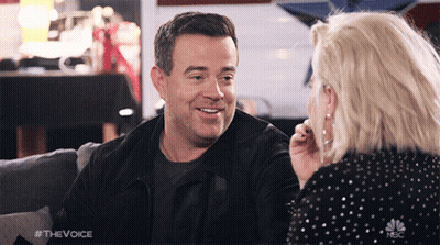 Man And Woman Sitting On Couch With Voice Onscreen GIF