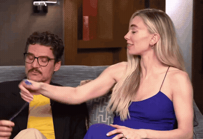 Man And Woman Sitting On Couch Woman Holding Arm GIF