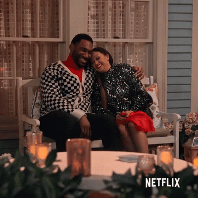 Man And Woman Sitting On Porch With Netflix Logo GIF