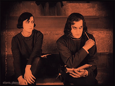 Man And Woman Sitting On Stairs GIF