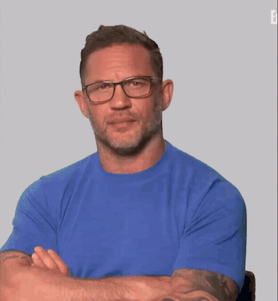 Man And Woman Sitting Smiling Woman In Hijab GIF