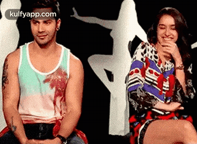 Man And Woman Sitting Together In Room GIF