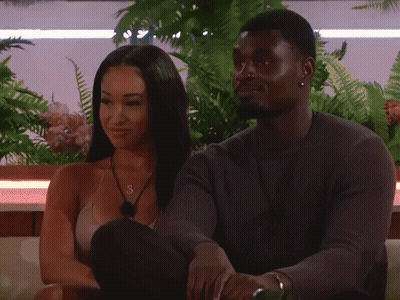 Man And Woman Sitting Together GIF