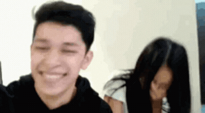 Man And Woman Smiling At Camera GIF