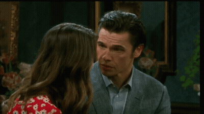 Man And Woman Smiling At Each Other GIF