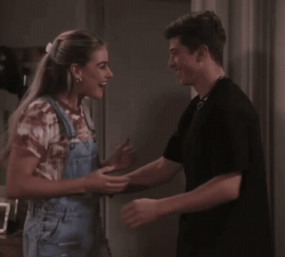 Man And Woman Smiling At Each Other GIF