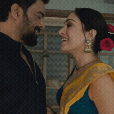 Man And Woman Smiling At Each Other GIF