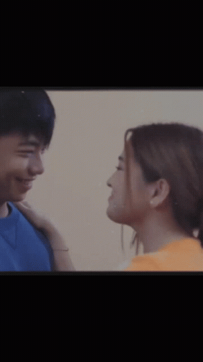 Man And Woman Smiling At Each Other GIF