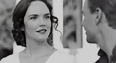 Man And Woman Smiling At Each Other GIF