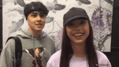 Man And Woman Smiling For Camera GIF