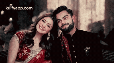 Man And Woman Smiling For Camera GIF