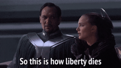 Man And Woman So This Is How Liberty Dies GIF