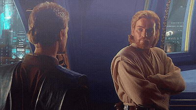 Man And Woman Standing Arms Crossed Looking At Each Other GIF