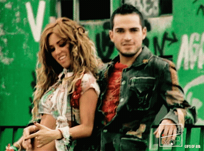 Man And Woman Standing Before Green Wall Saying GIFs Of AIA GIF