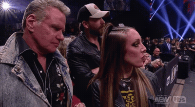 Man And Woman Standing Beside In Stadium GIF