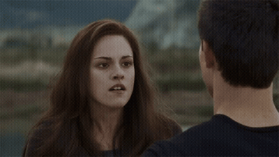Man And Woman Standing Beside Mountains GIF