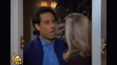 Man And Woman Standing By Door GIF
