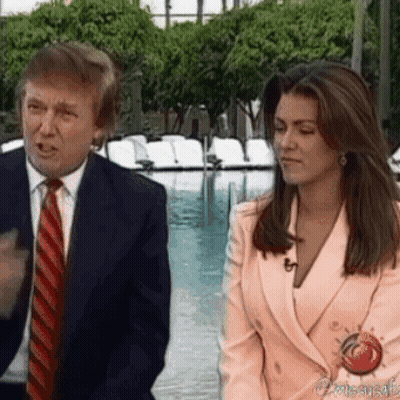 Man And Woman Standing By Pool GIF