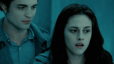 Man And Woman Standing In Blue Room GIF