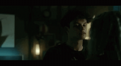 Man And Woman Standing In Dark Room GIF
