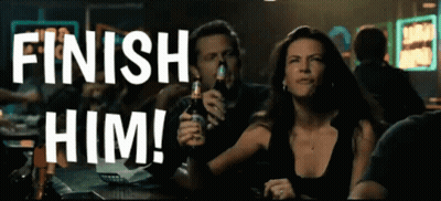 Man And Woman Standing In Dark Room GIF