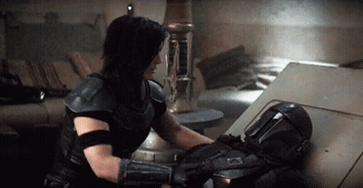 Man And Woman Standing In Desert GIF