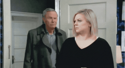 Man And Woman Standing In Doorway GIF