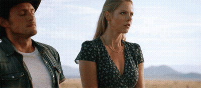 Man And Woman Standing In Field GIF