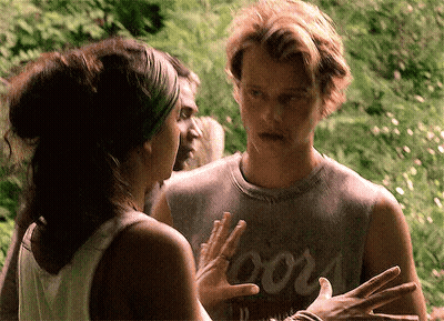 Man And Woman Standing In Forest GIF