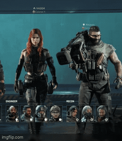 Man And Woman Standing In Front Of Engineer Screen GIF