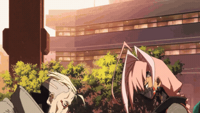 Man And Woman Standing In Front Of Large Building GIF
