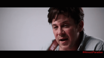 Man And Woman Standing In Front Of Police Car #AlmostParadise GIF