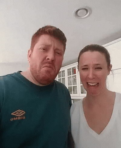 Man And Woman Standing In Kitchen GIF