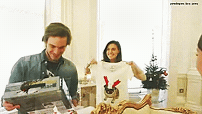 Man And Woman Standing In Living Room GIF
