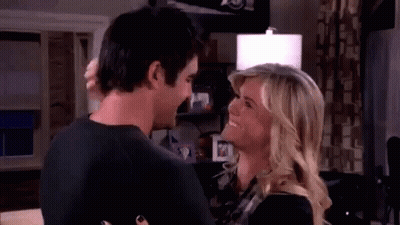 Man And Woman Standing In Living Room GIF