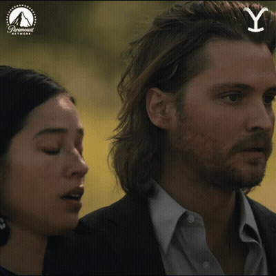 Man And Woman Standing In Paramount Network Ad GIF