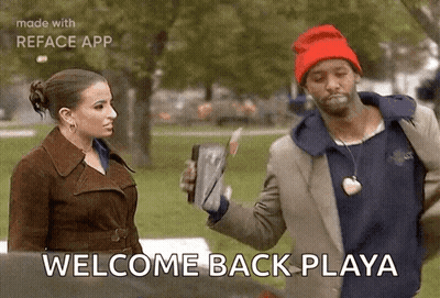 Man And Woman Standing In Park GIF