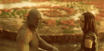 Man And Woman Standing In Puddle GIF
