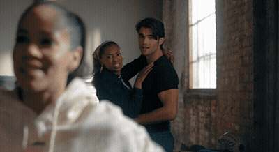 Man And Woman Standing In Room With Window GIF