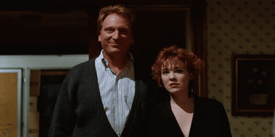 Man And Woman Standing In Room GIF