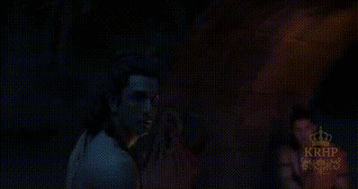 Man And Woman Standing In The Dark GIF