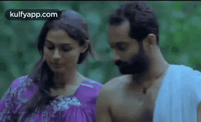 Man And Woman Standing Looking At Each Other GIF