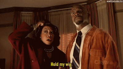 Man And Woman Standing Man Says Hold My Wig GIF
