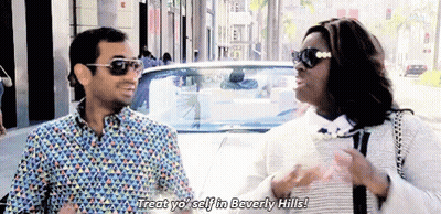 Man And Woman Standing Next To A White Car GIF