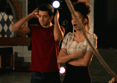 Man And Woman Standing Next To Each Other GIF