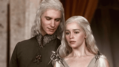 Man And Woman Standing Next To Each Other GIF
