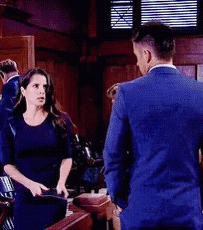 Man And Woman Standing Next To Each Other GIF